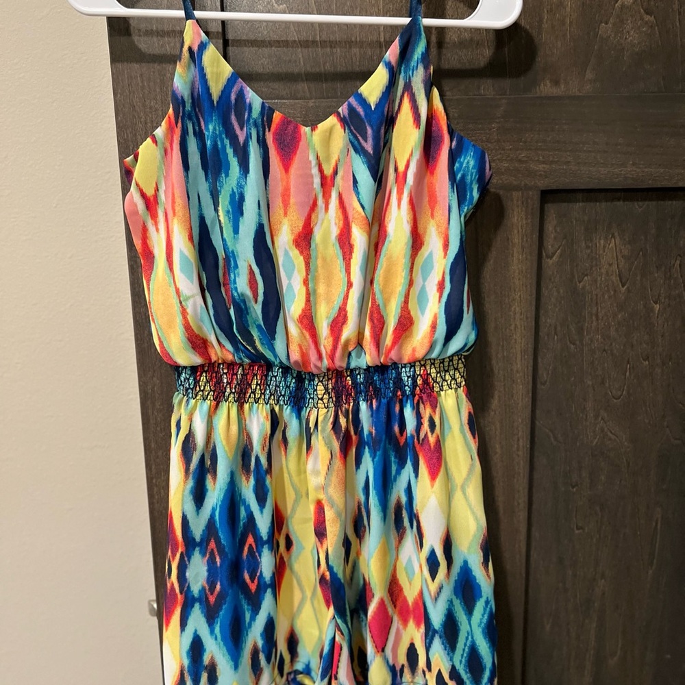 Dynamic Red and Blue Romper with Vibrant Design